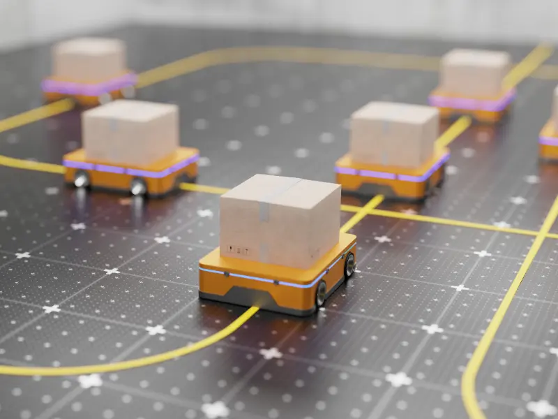 ​​Une représentation de robots mobiles autonomes (AMR) en action sur un circuit imprimé​